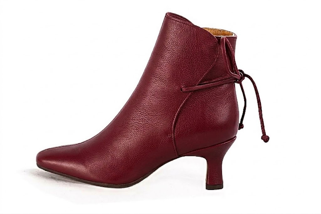 Feminine back lace-up ankle boots featuring romantic corset-style ties, designed for a striking silhouette from day to evening, in burgundy leather with square toe and mid spool heel - Florence KOOIJMAN